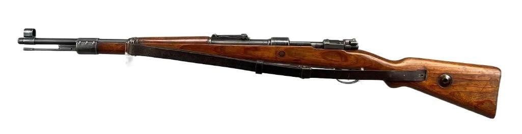 WW2 German byf 1944 Mauser K98 8mm Bolt Action Rifle: Serial Number 16655g Matching Throughout, 44E30 marked on Barrel, Waffenamt Marks Throughout, Good Condition, Clean Bore with Rifling Present, Includes Leather Sling.