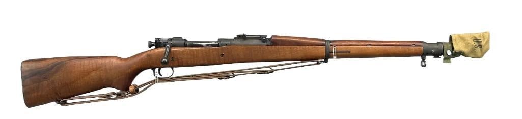 U.S. Springfield Model 1903A1 30-06 cal. Bolt Action Rifle: Serial Number 1351181, Excellent Condition, Includes Leather Sling, Canvas Muzzle Cover by E.A. Brown MFG. Co. 1944, and 1943 US Military Canvas Bag, Barrel is Marked SA with Flaming Bomb Ordnance Dep