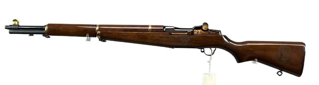 Limited Edition U.S. Springfield M1 Garand West Point Tribute .30 cal. Semi Auto Rifle: Serial Number 7111881, Limited Edition Number 39 of 300, Gold Plated, Stock Engraved with Batte Monument and West Points Crest, New Condition. Association of Gradutes USMA
