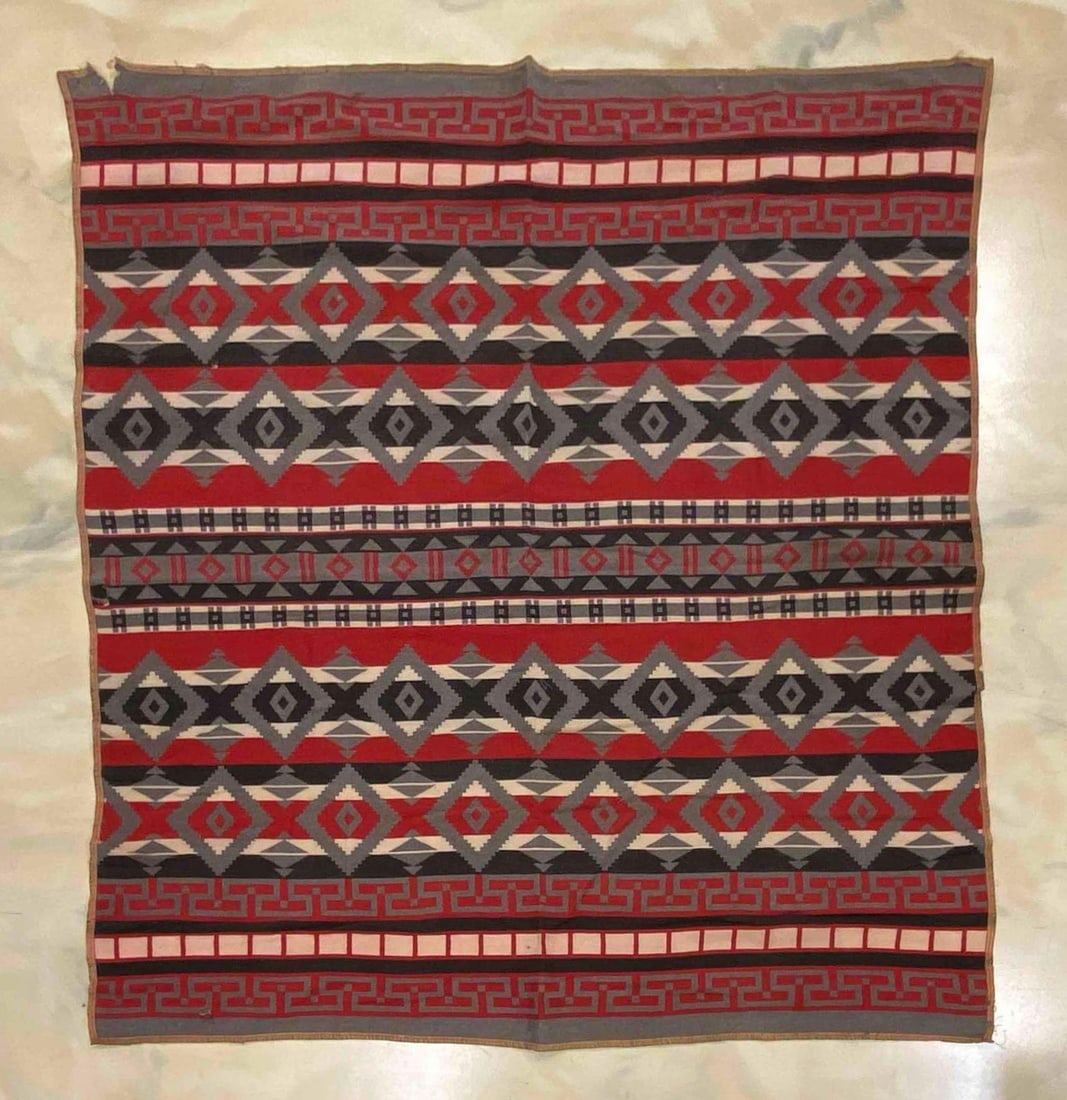 Native American Woven Wool Blanket: Some small holes and tears, Larger tear on top left corner, Measures 72 1/2 x 68 1/2 inches.