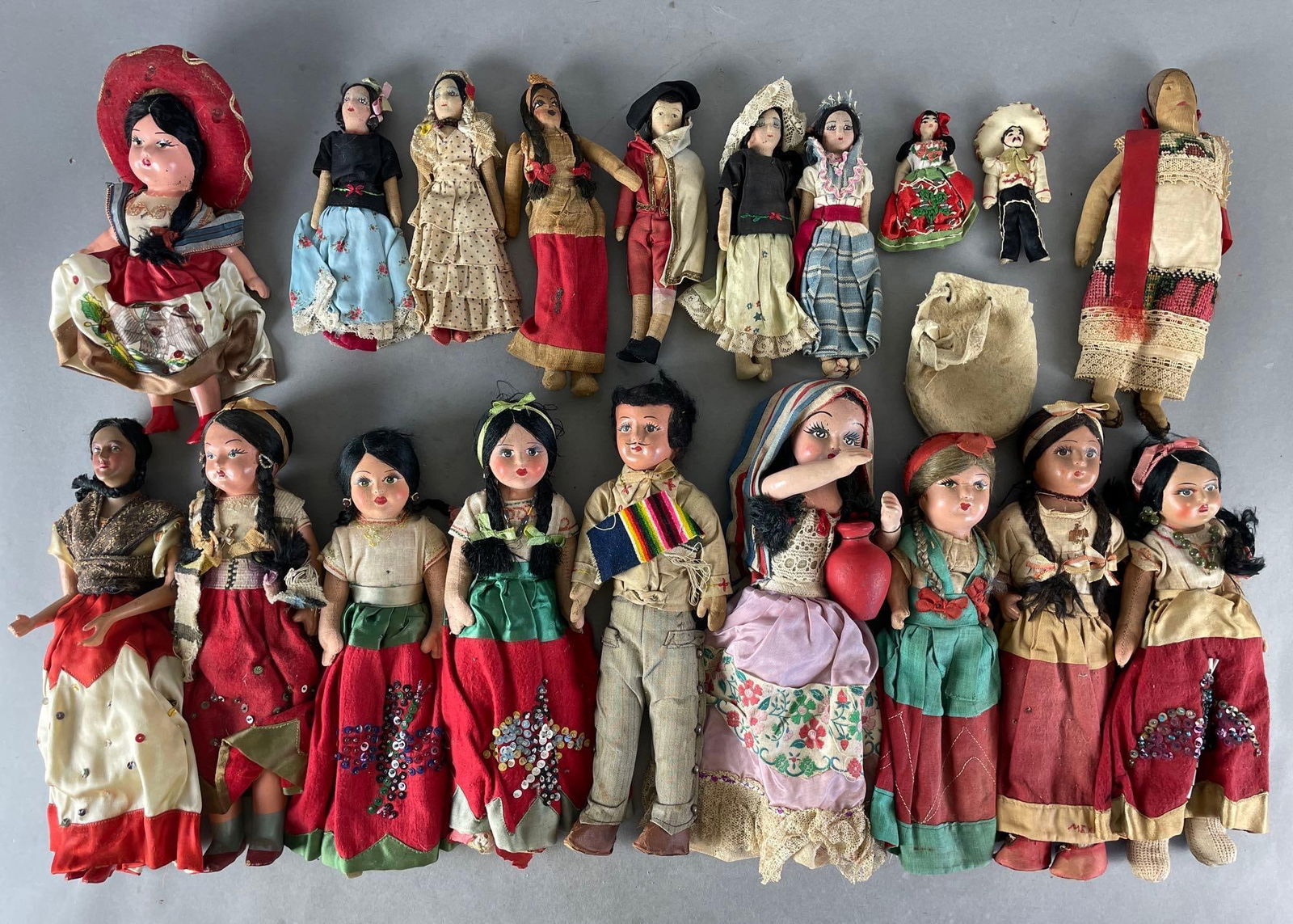 Group of 15+ Vintage Hispanic Dolls: composite, and fabric dolls. Largest measures 13 inches