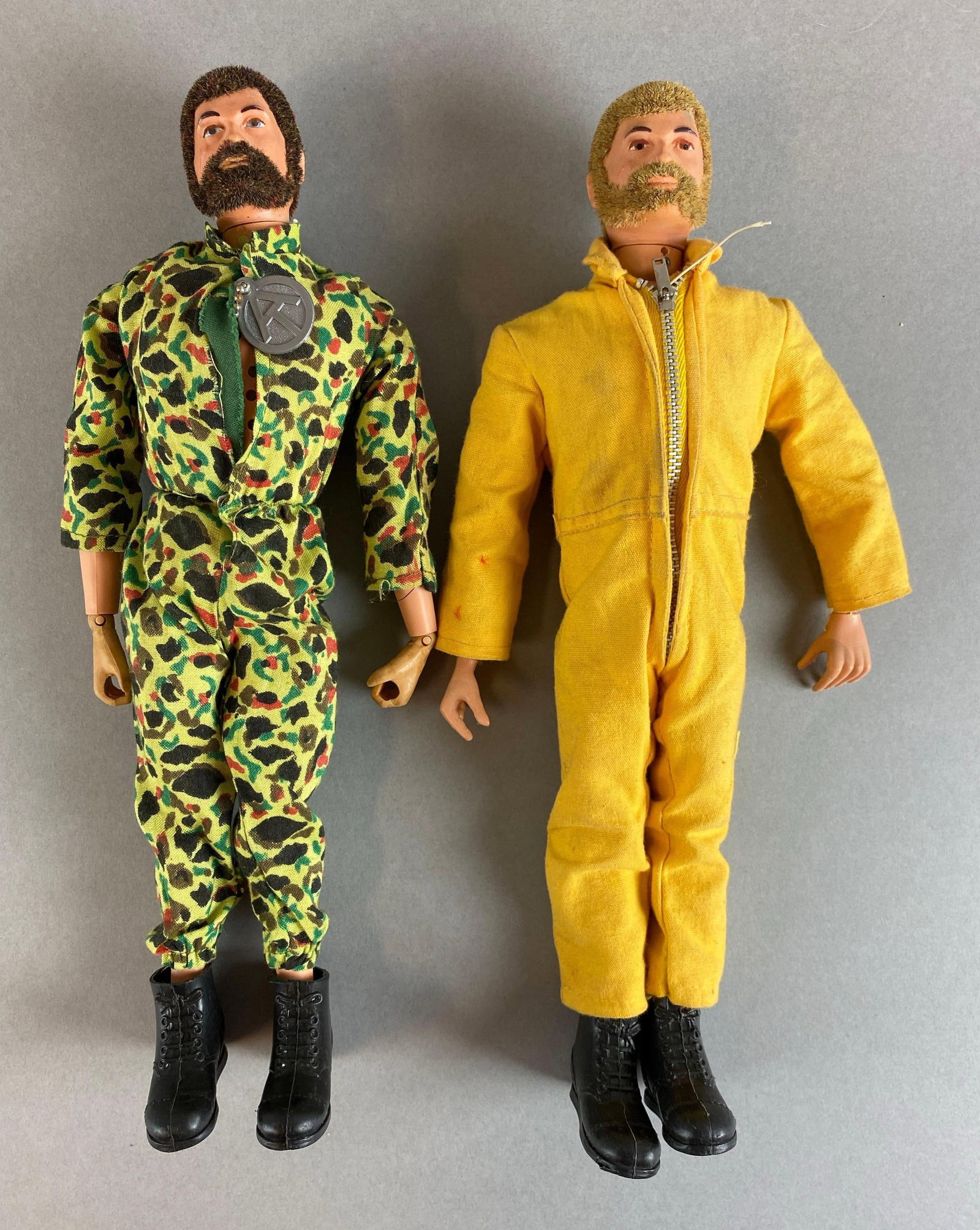 Group of 2 GI Joe Flocked Hair Action Figures: Both voice boxes not in working condition, discoloration on brown hair hands, blond figures missing section of dog tag