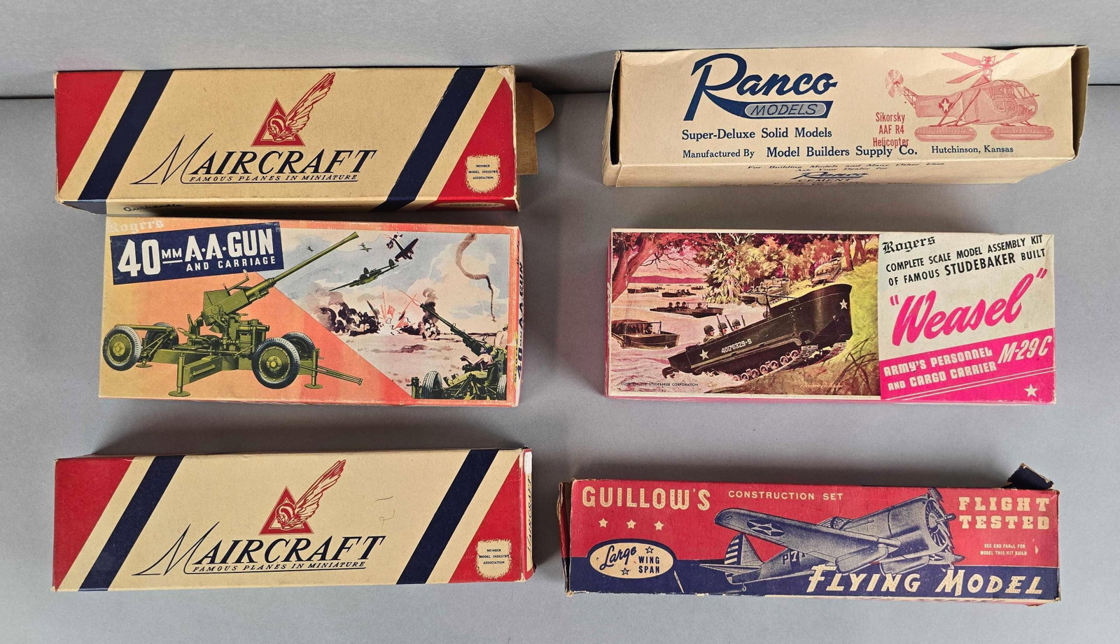 Group of 6 US Military Plastic Model Kits: Includes Roger's 40mm AA Gun, Aircraft, Ranco AAF R4 Helicopter and more, largest box measures 2 x 12 x 4 3/4 inches