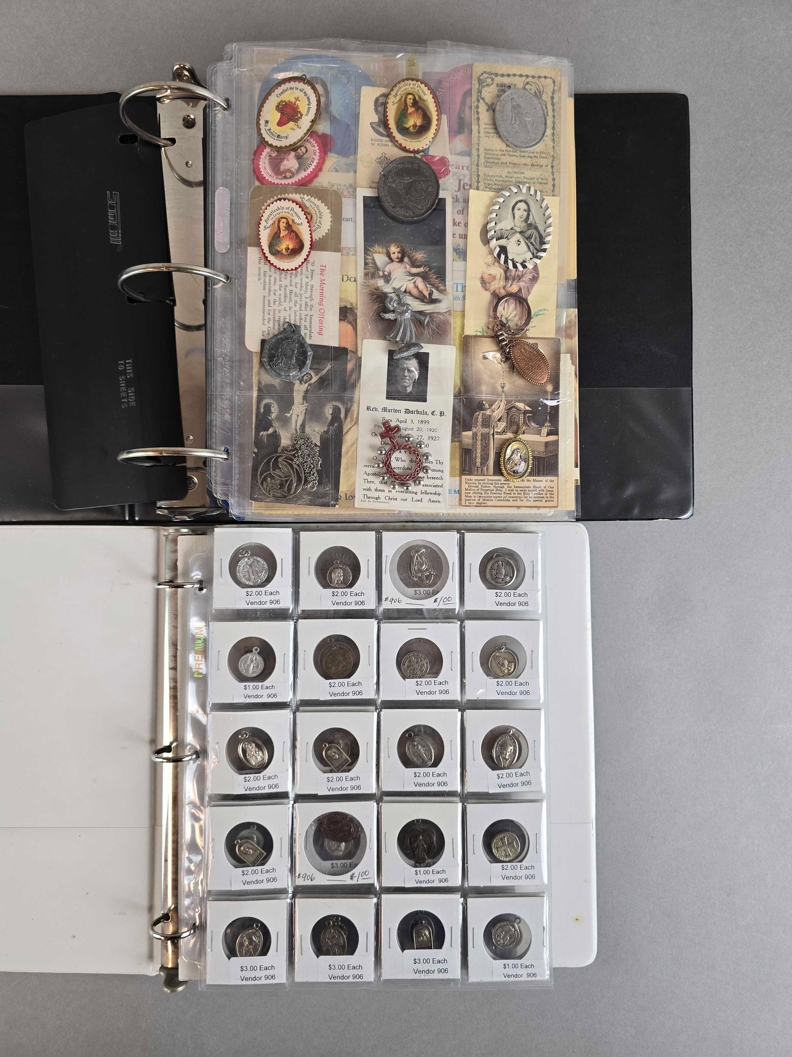 Group of Religous Medals, Ephemera and More: Includes mostly catholic and Christianity related artifcats, largest binder measures 12 x 11 1/2 inches
