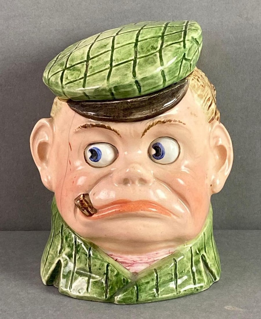 Palmer Cox Porcelain Figural Tobacco Jar: Large crack on right side of face, crazing throughout, measures 6 x 4 1/4 x 4 1/4 inches