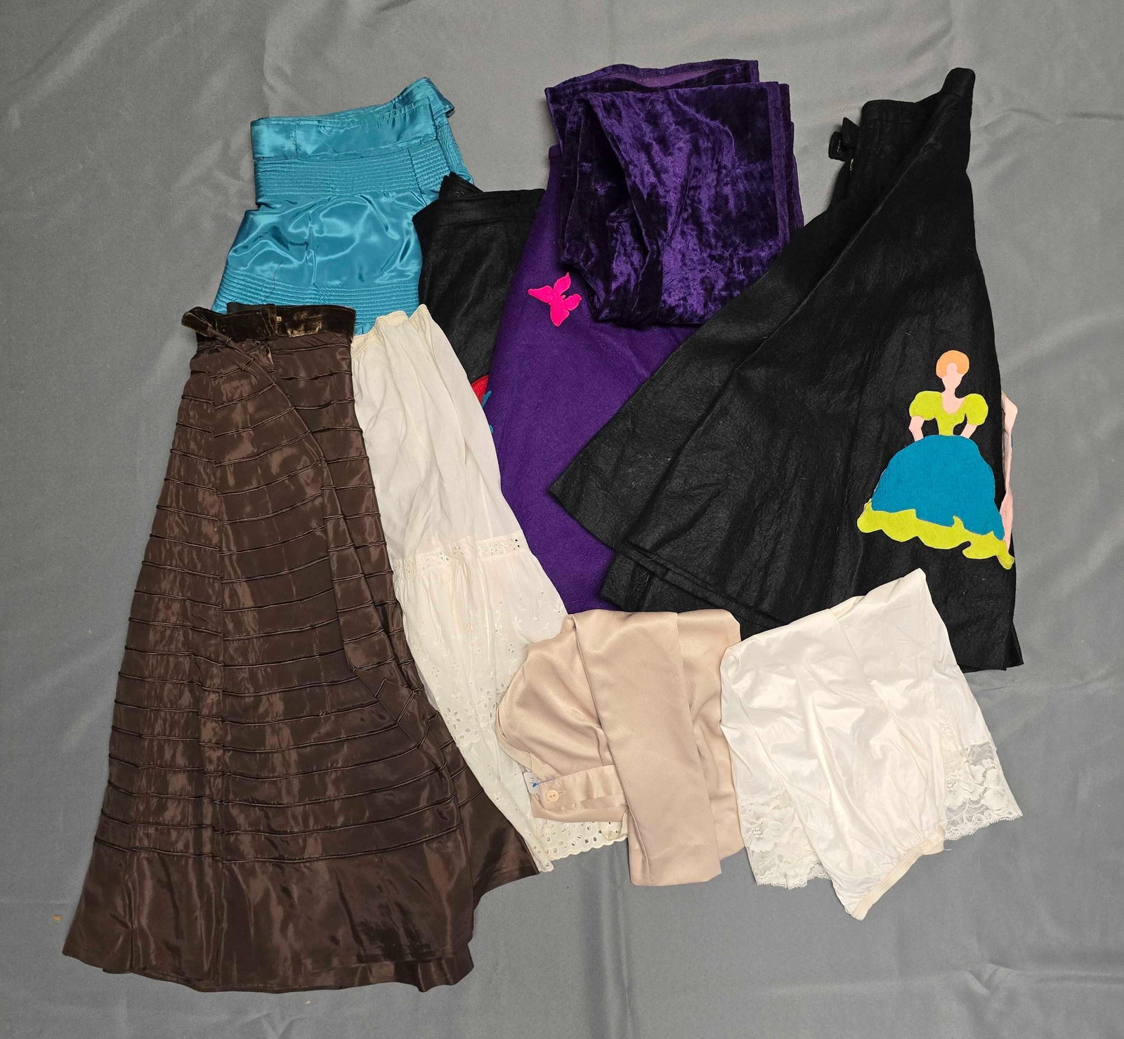 Group of 9 Womens Skirts and Bottoms: Some still have original tags from purchase, sizes range from small to medium