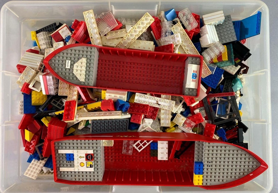 Large Group of Lego Bricks and More: Includes assortment of most standard Lego bricks in variety of colors, some discoloration throughout, boat hull shown measures 17 x 4 x 2 1/2 inches