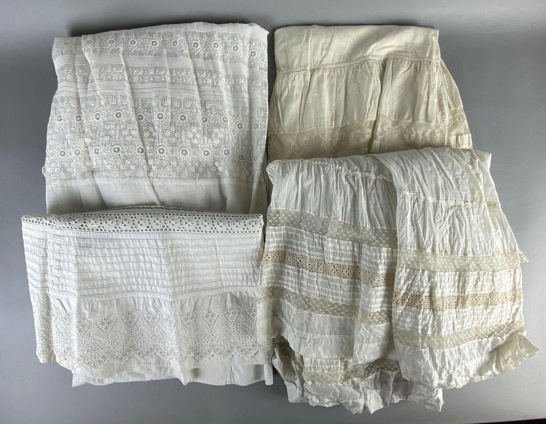 Group of 4 Antique White Lace Womens Petticoat Skirts: Some small tears and stains on all, Largest measures 45 inches long.