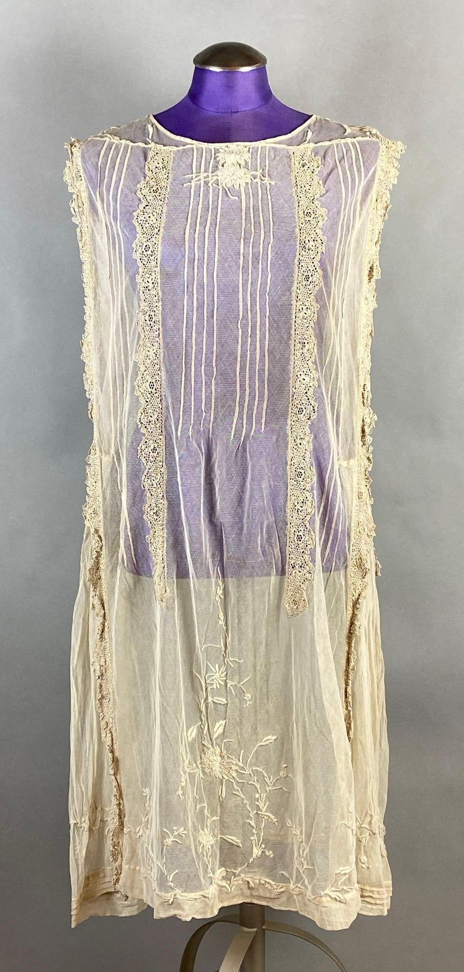 Antique Beige Sheer Netted Lace Dress: Shoulder to shoulder measures 15 inches, Overall length 39 1/2 inches.