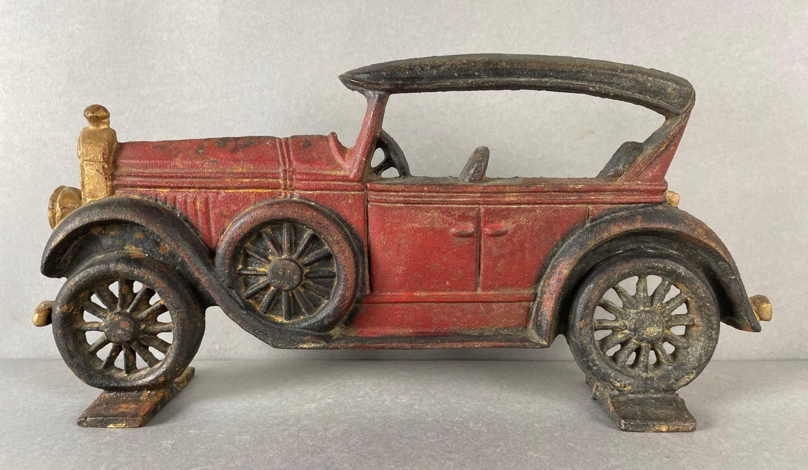 Painted Cast Iron Car Doorstop: Measures 6 1/4 x 13 x 2 1/2 inches