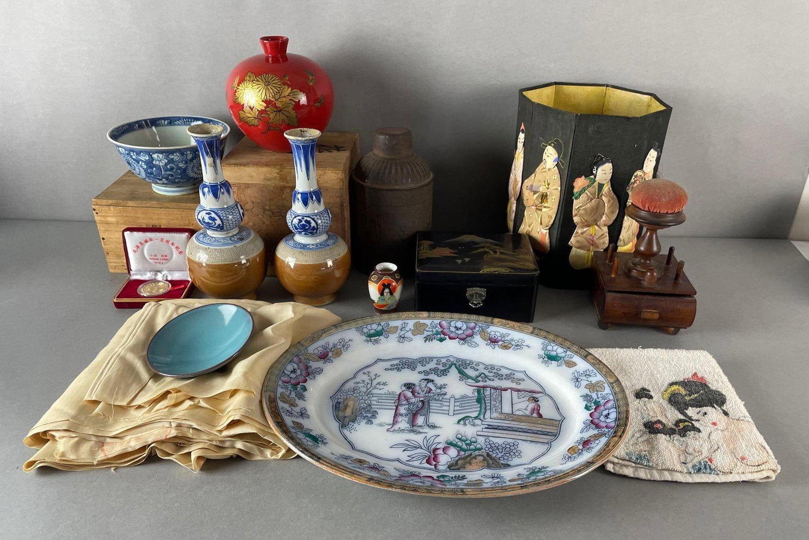 Group Japanese and Asian Pottery and More: Includes Japanese silk, repaired vase and bowl, trinket box, charger measures 11 x 14 inches