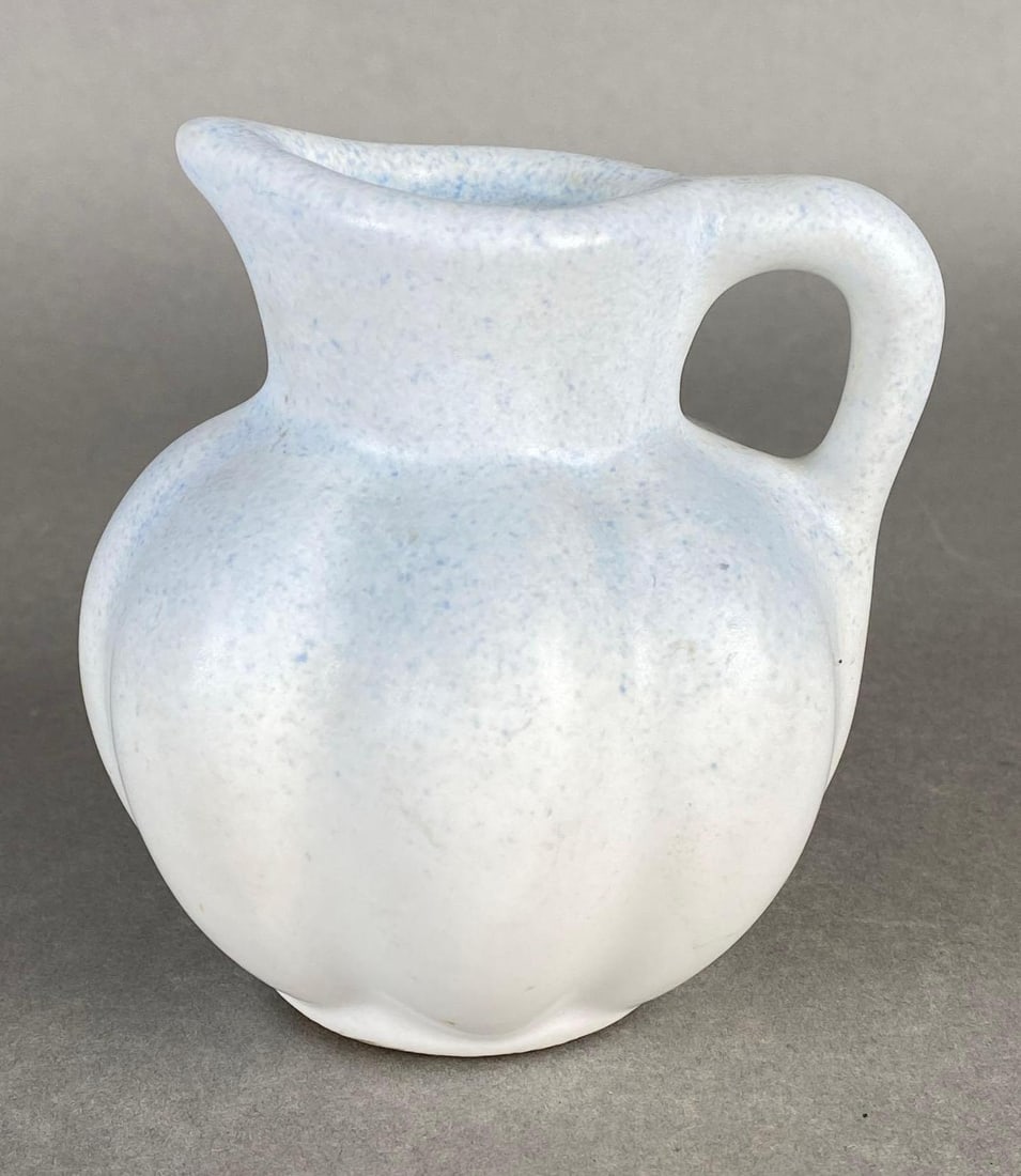Van Briggle White and Blue Speckled Pottery Melon Shape Creamer: Colorado Springs, Measures 4 x 3 3/4 x 3 3/4 inches.