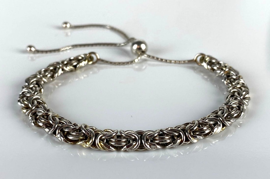 Sterling Silver Sliding Chain Bracelet: Total weight 7.4g, Measures 9 inches around fully extended.