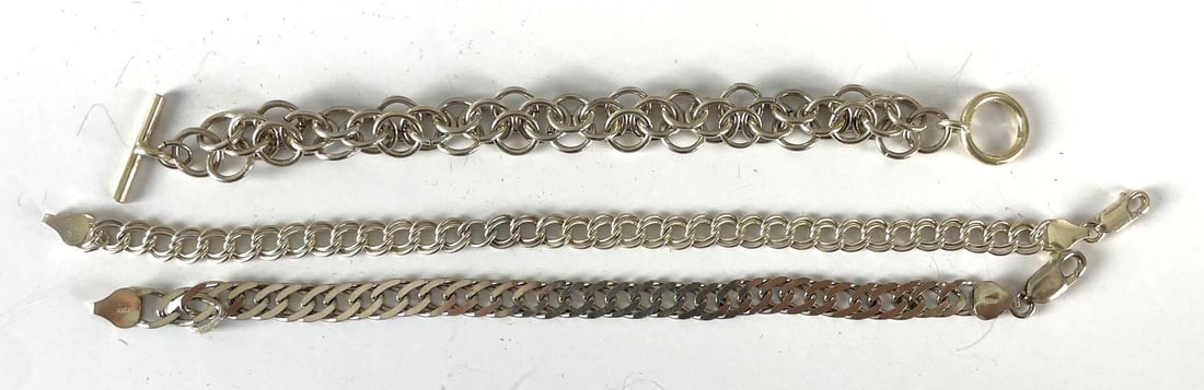 Group of 3 Sterling Silver Charm Bracelets: 2 marked Italy, 6 1/2 - 8 inches long. 35.7g total weight
