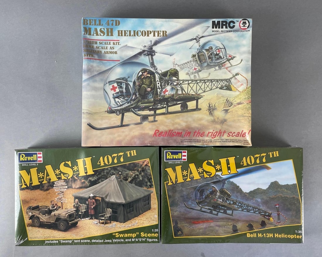 Group of 3 M.A.S.H. Model Kits: All sealed, includes Revell helicopter, swamp scene, MRC helicopter. 1/35 scale