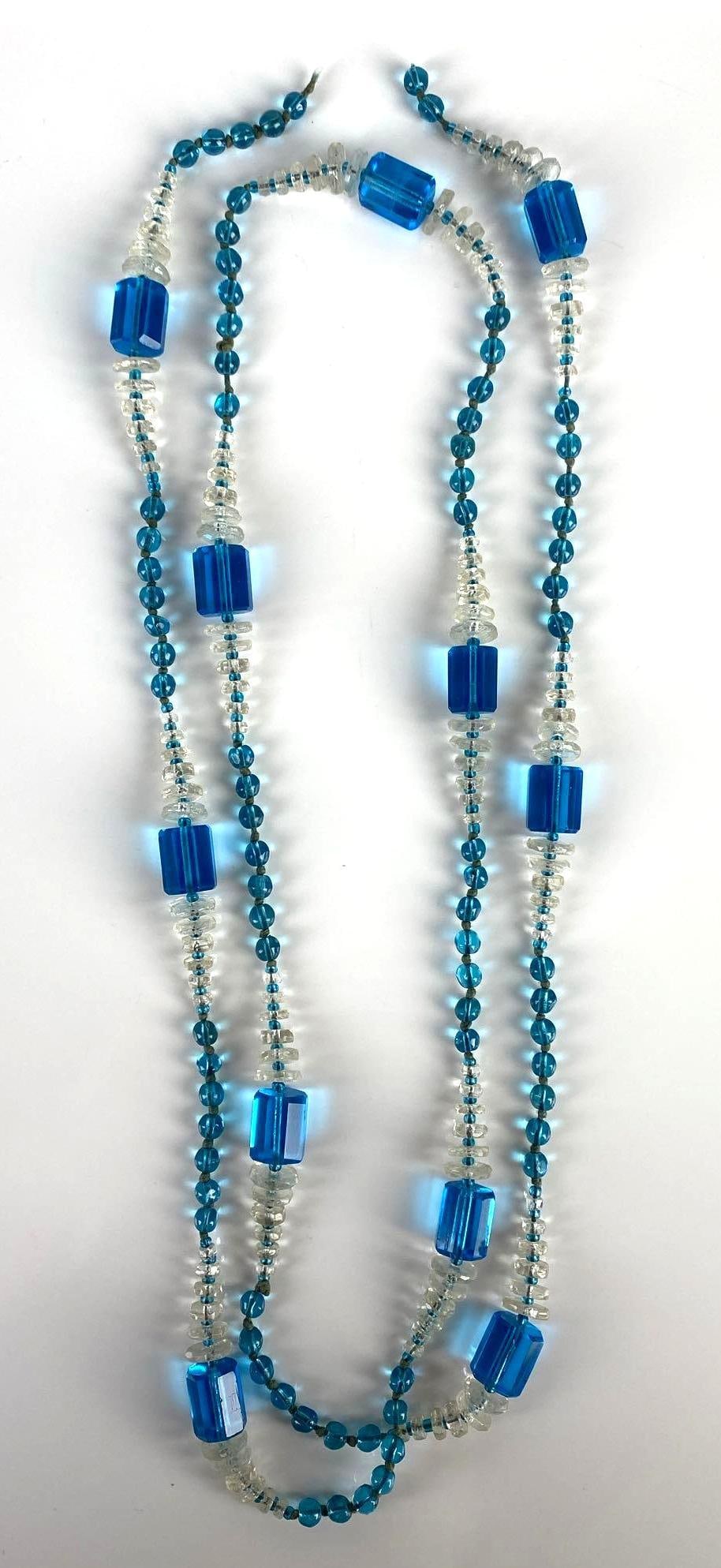 Cobalt and Clear Glass Necklace: No clasp, Measures 48 inches long.