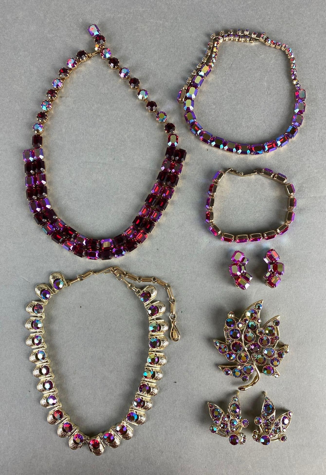 Group of 7 Magenta Rhinestone Costume Jewelry: Includes Coro, Weiss, and BSK, Longest necklace measures 15 inches long.