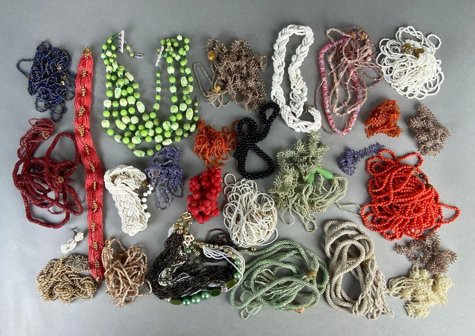 Group of 20+ Beaded Necklaces and Strands: Includes plastic, clay, faux pearl, and more.