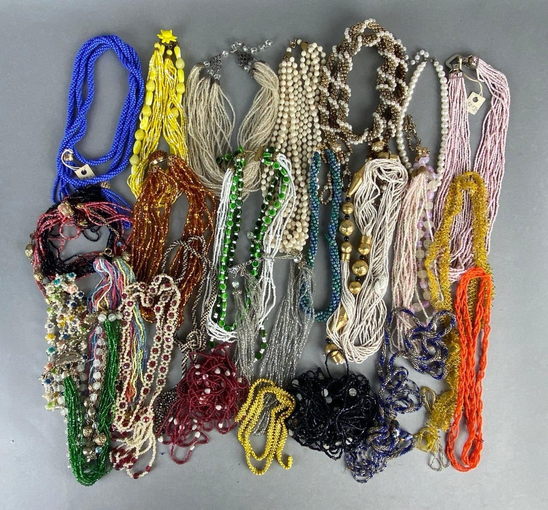 Group of 20+ Beaded Costume Jewelry Necklaces and Strands: Includes colorful, layered, floral, rainbow, and more, Some broken or missing strands,