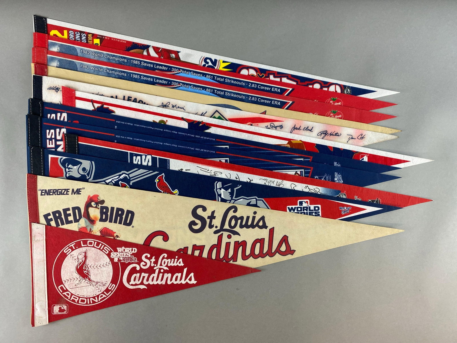 12 - St. Louis Cardinals Pennants: 1982, 2006, 2011 Various World Series Champions, 2006 Bruce Sutter HOF, 1998 Mark McGwire 62 HRs, Fred Bird Energize Me Pennant, and More