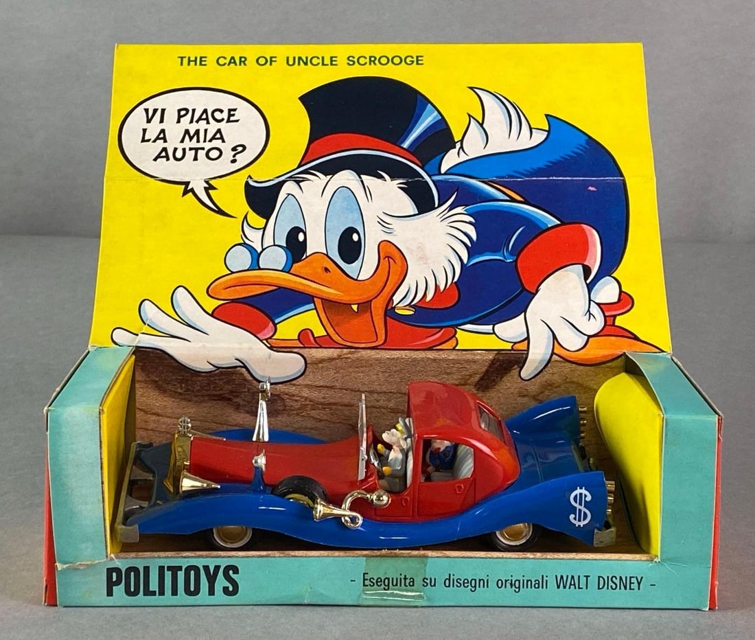 Politoys Walt Disney Uncle Scrooge Die-Cast Vehicle: Made in Italy, Some paint loss in character, Some tears in box, In original box, Box measures 2 1/2 x 8 x 3 inches.