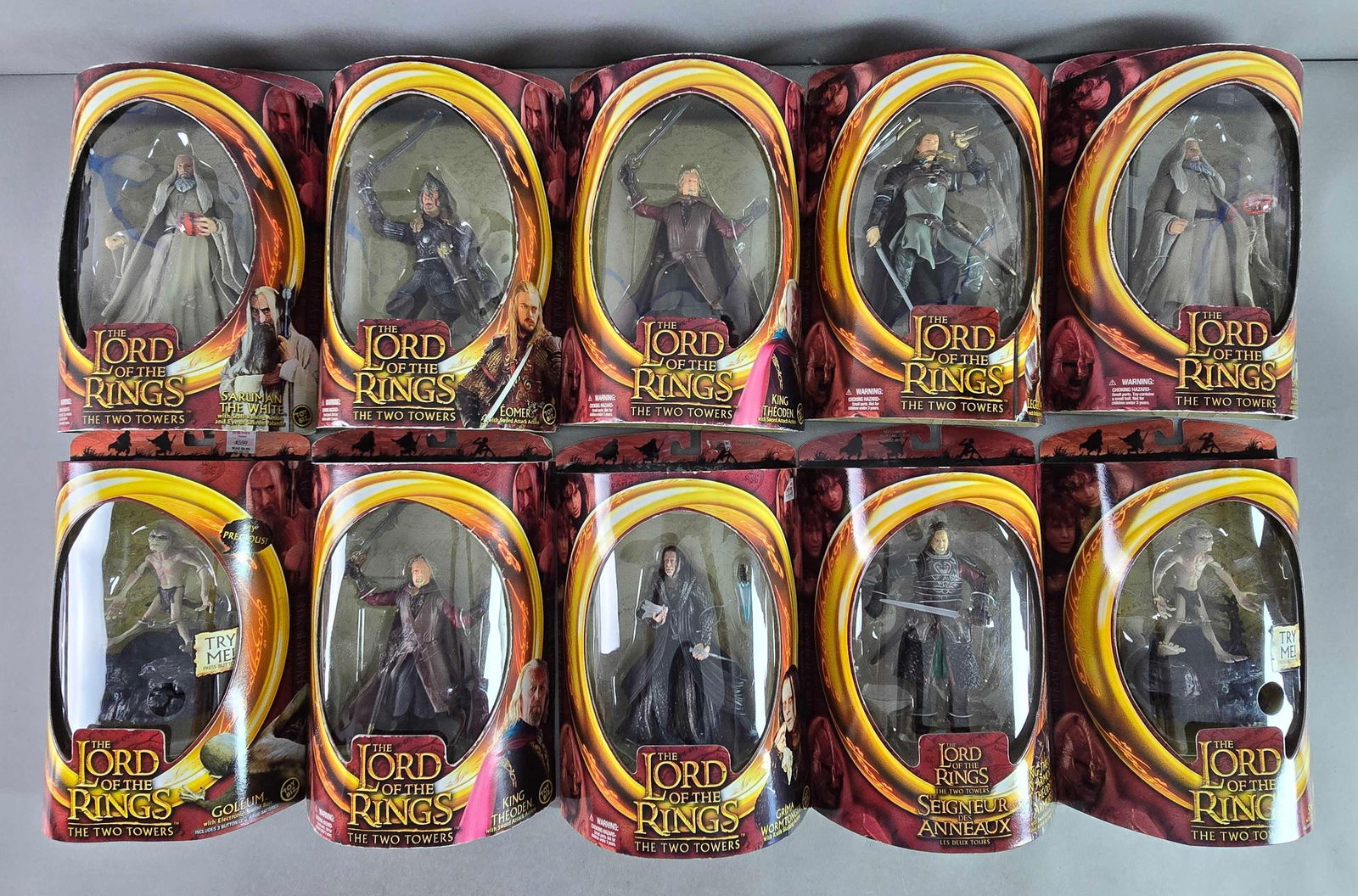 Group of 10 Toy Biz The Lord of the Rings Action Figures: Includes King Theoden, Gollum, Grima Wormtongue and more, like new in original packaging, each measures 12 x 8 x 3 inches