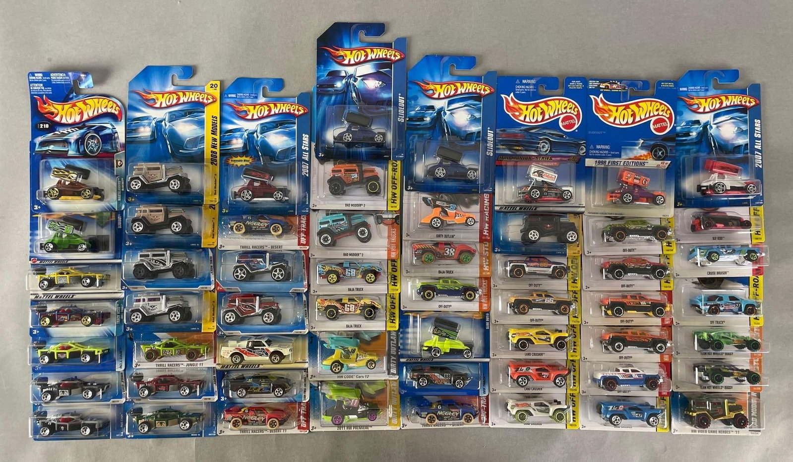 Group of 55+ Mattel Hot Wheels Off-Road Die-Cast Vehicles: Includes slideout, Baja truck, rip rod, and more