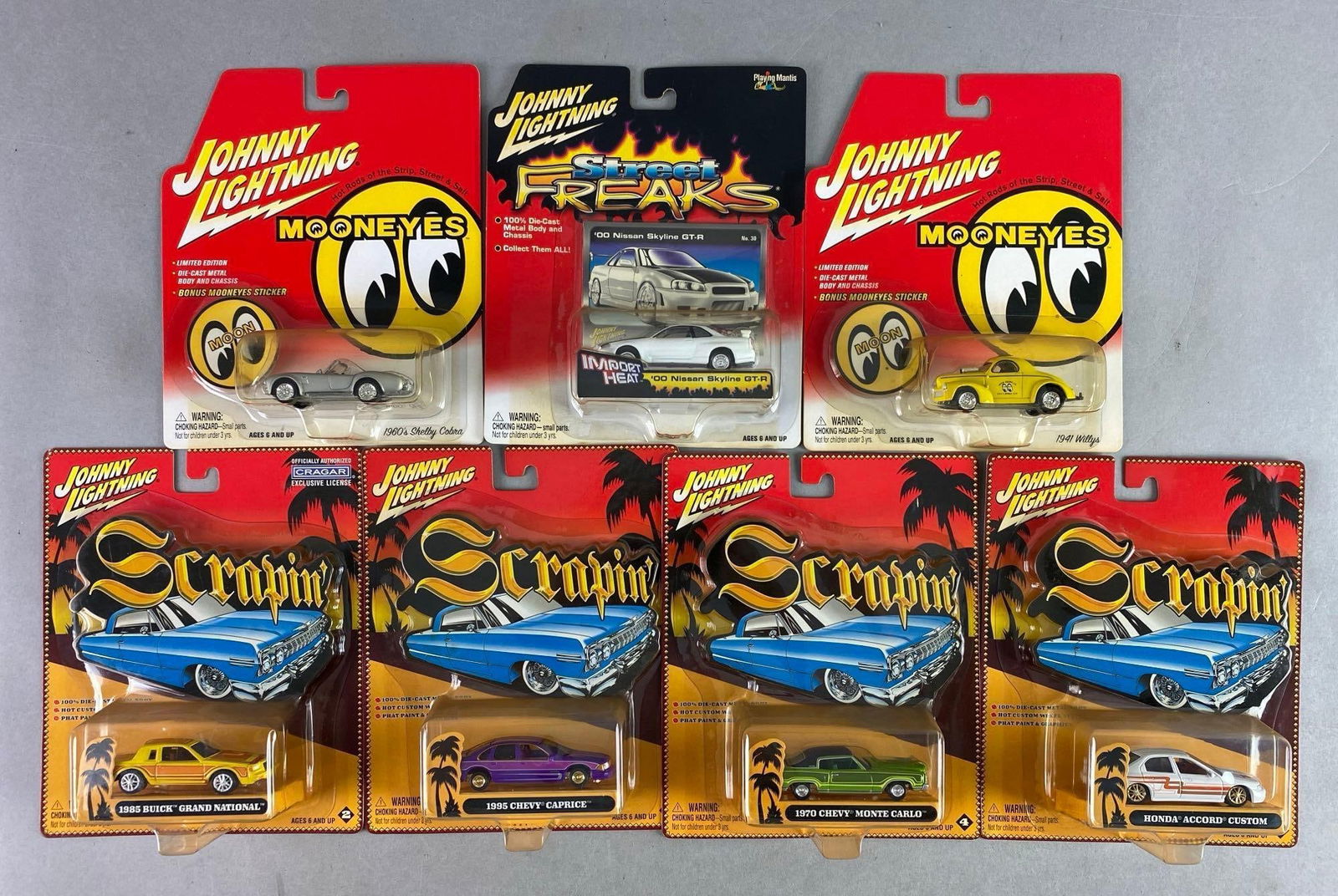 Group of 7 Playing Mantis Johnny Lightning Cars (1 of 3)