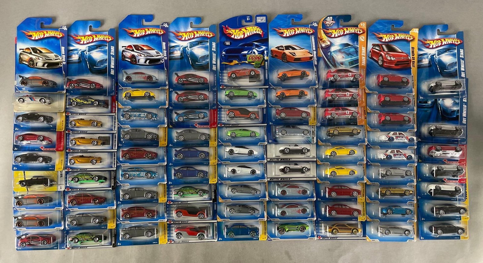 Group of 75+ Mattel Hot Wheels Assorted Die-Cast Cars: Includes Aston Martin, delorean, Lamborghini, Maserati, and more
