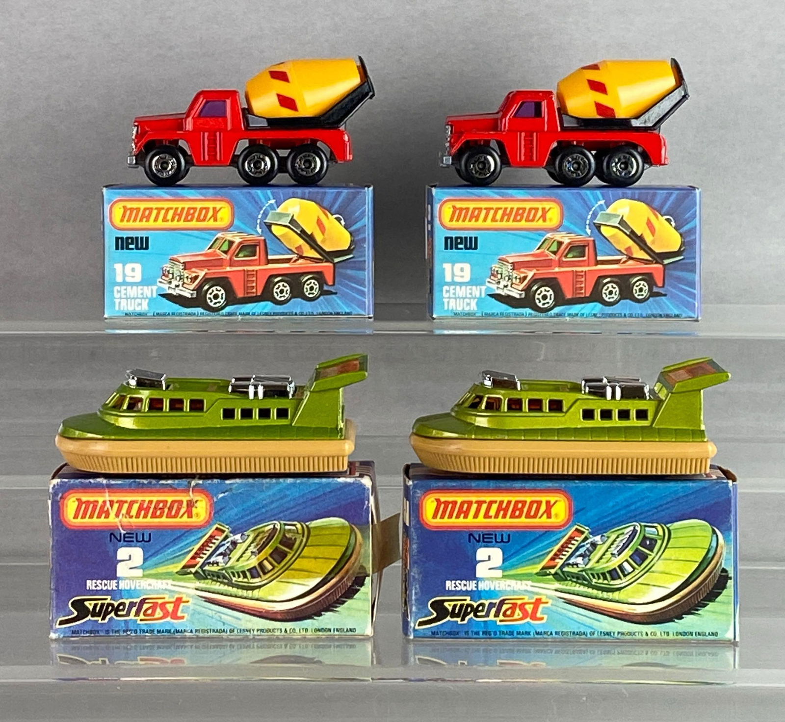 Group of 4 Matchbox No. 2 and 19 Die-Cast Vehicles: With boxes, A Lesney Product, made in England, Color: green and red, red and purple windows, tan and silver bases, black plastic wheels