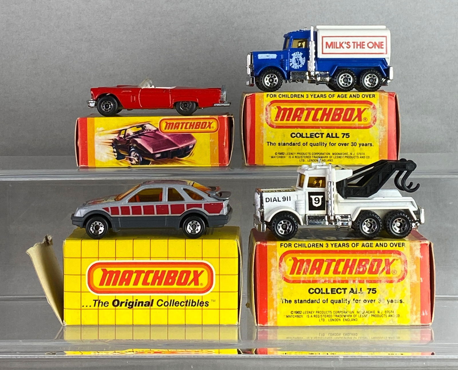 Group of 4 Matchbox No. 6, 42, 15 and 56 Die-Cast Vehicles: With boxes, A Lesney Product, made in England, Color: Blue, white and red, yellow and clear windows, silver and black bases, black plastic wheels, some moisture damage to boxes