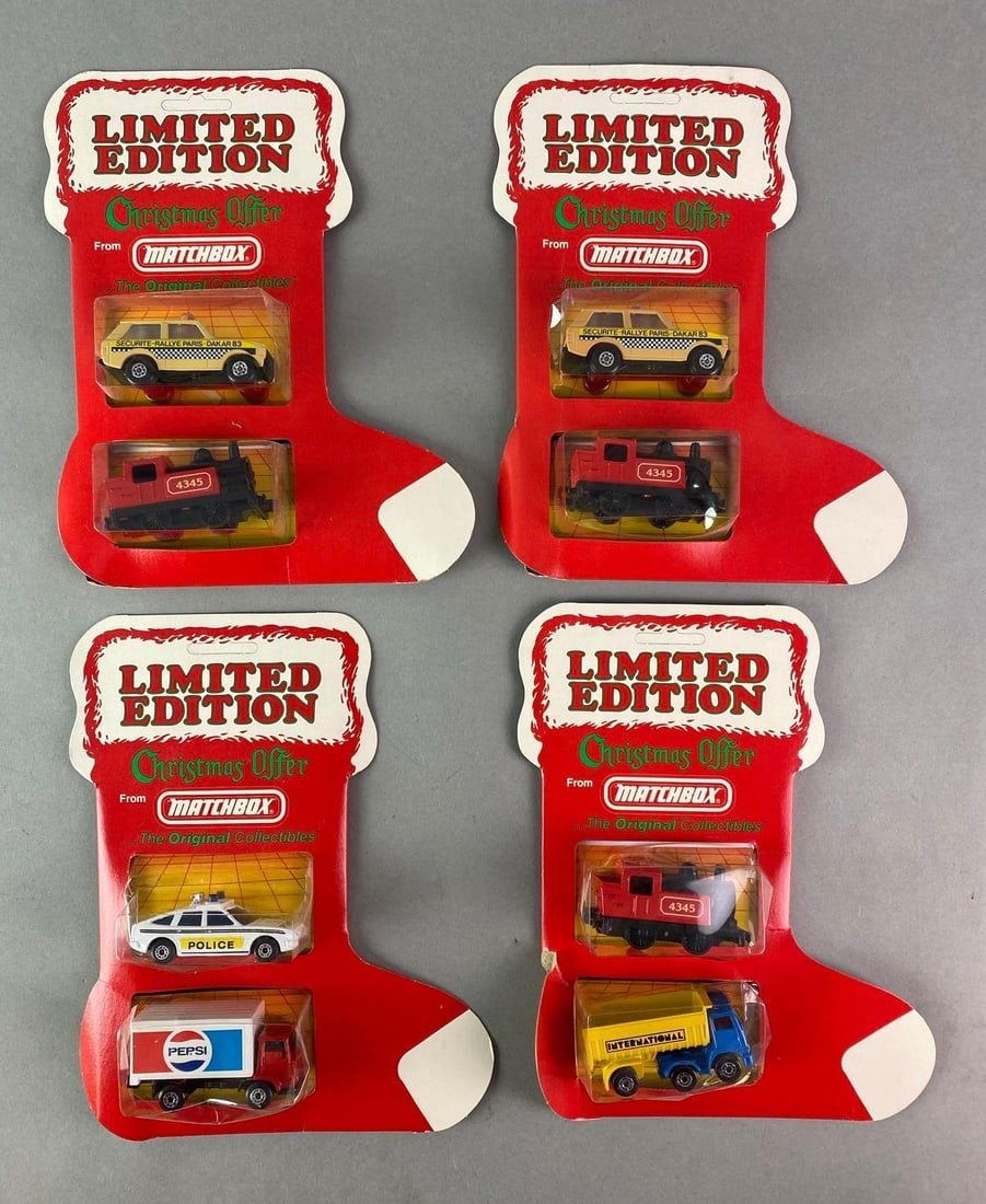 Group of 4 Matchbox Christmas Offer Die-Cast Vehicle Stockings: Limited Edition, Vehicles include Police Car, Train Engine, Taxi Cab, and more, Packaging measures 9 1/4 x 7 1/2 x 1 1/4 inches.