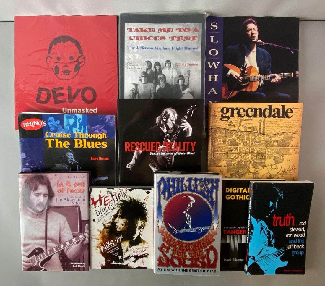 Group of 11 Music and Musician Books: Includes books on Devi, Phil Lesh, Walter Trout, Nikki Sixx, and more, Largest measures 11 1/4 x 10 inches.