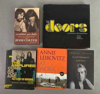 Group of 4 Artist or Author Signed Hardcover Books and More: Includes signatures from Jessi Colter, Annie Leibovitz, Bernie Taupin, and Michael Azerrad, Also includes unsigned copy of The Doors by Ben Fong-Torres, Largest measures 11 x 12 inches.
