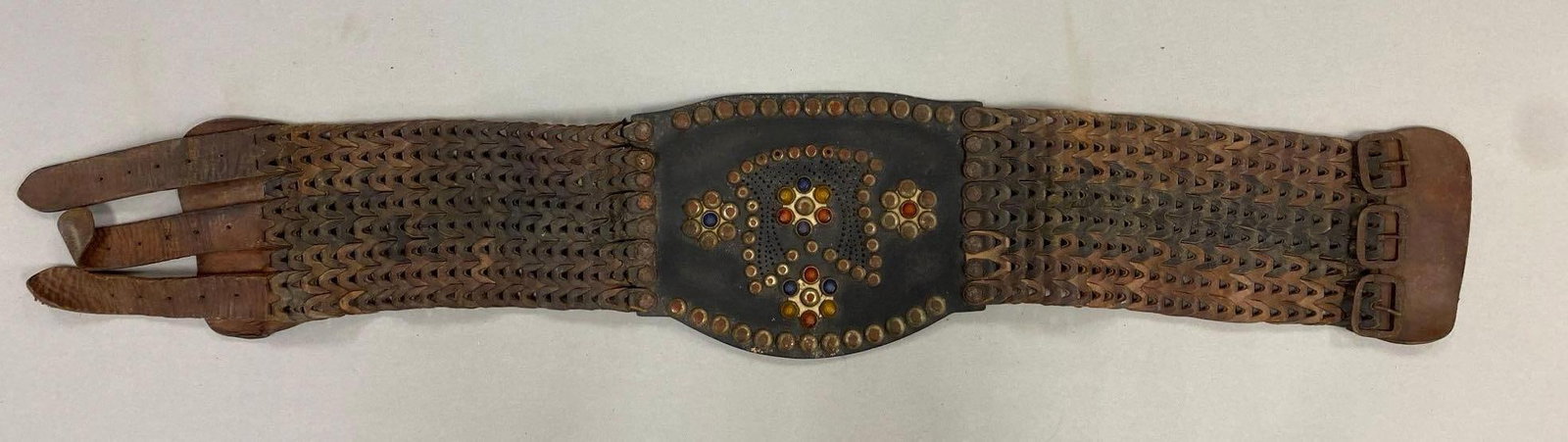 Vintage Studded Chained Motorcyclists Kidney Belt: This authentic riding gear is designed to provide both style and essential support for motorcyclists. Crafted from high-quality leather, this kidney belt showcases the durability and craftsmanship tha