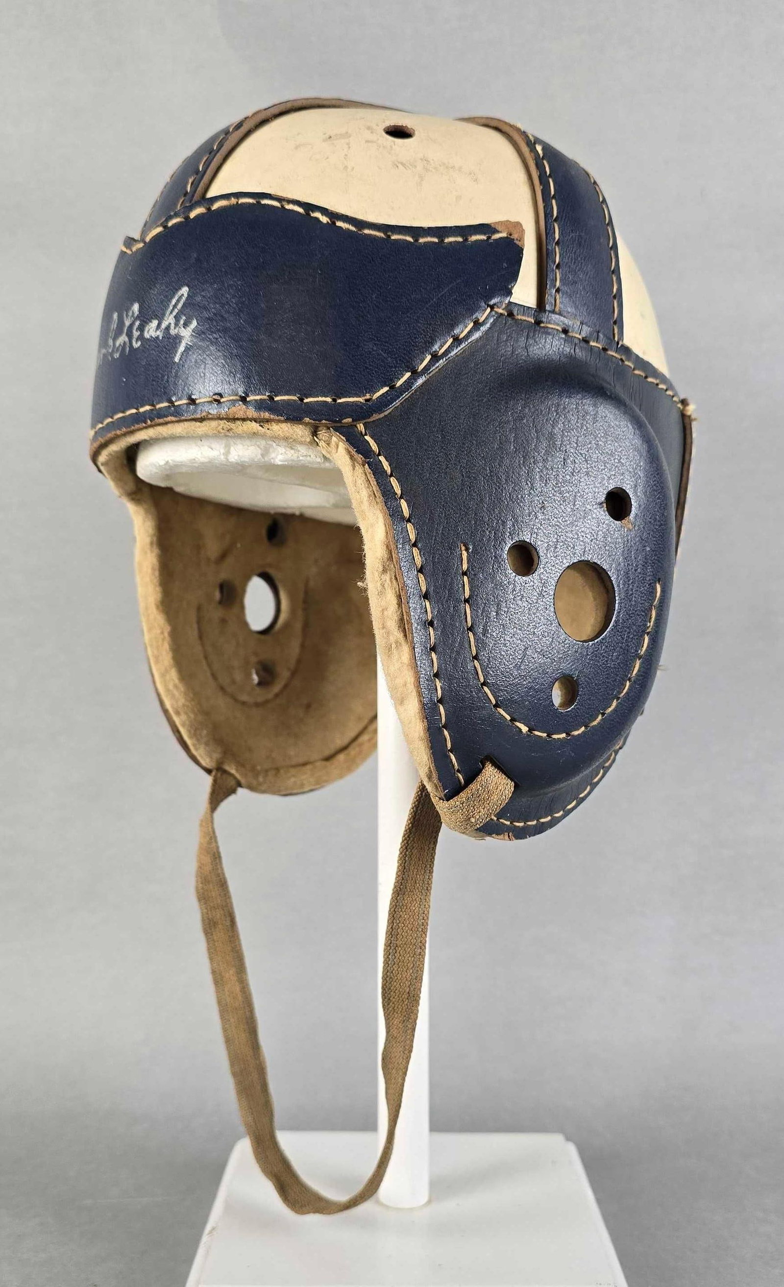 Vintage Mac Gregor Goldsmith H626 Leather Football Helmet: name wrote on forehead section, measures 9 1/2 x 8 x 8 inches