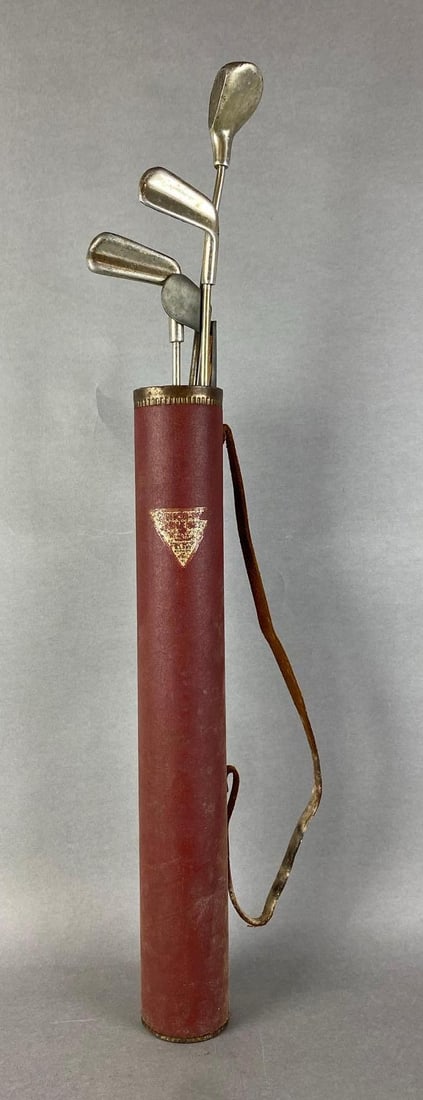 Vintage Junior-Pro Golf Set and Carrying Canister: unknown set completion, small tears throughout strap, canister measures 20 x 2 1/2 x 2 1/2 inches