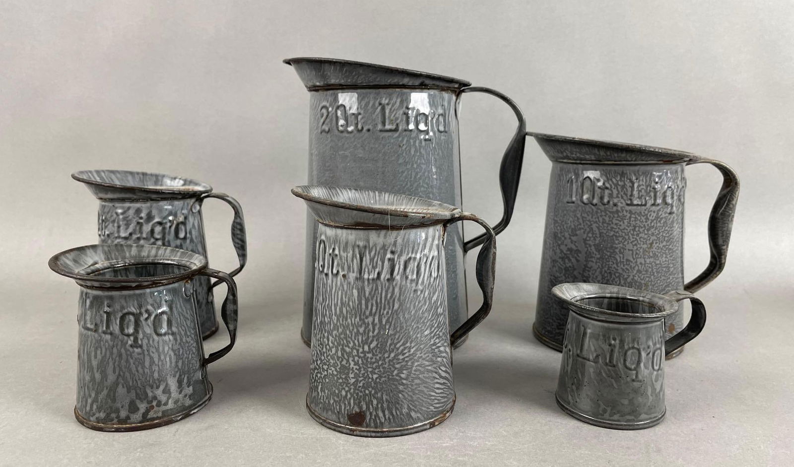 Group of Enamelware Measuring Pitchers (1 of 3)