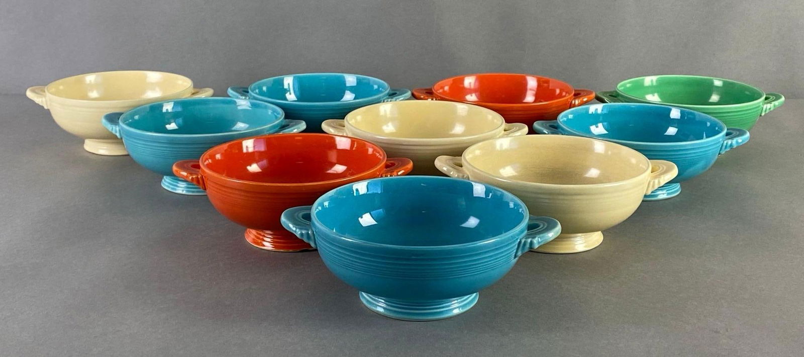 Group of 10 Fiestaware Double-Handled Soup Bowls: Some small chips along bases, All measure 2 1/4 x 6 1/2 x 5 inches.