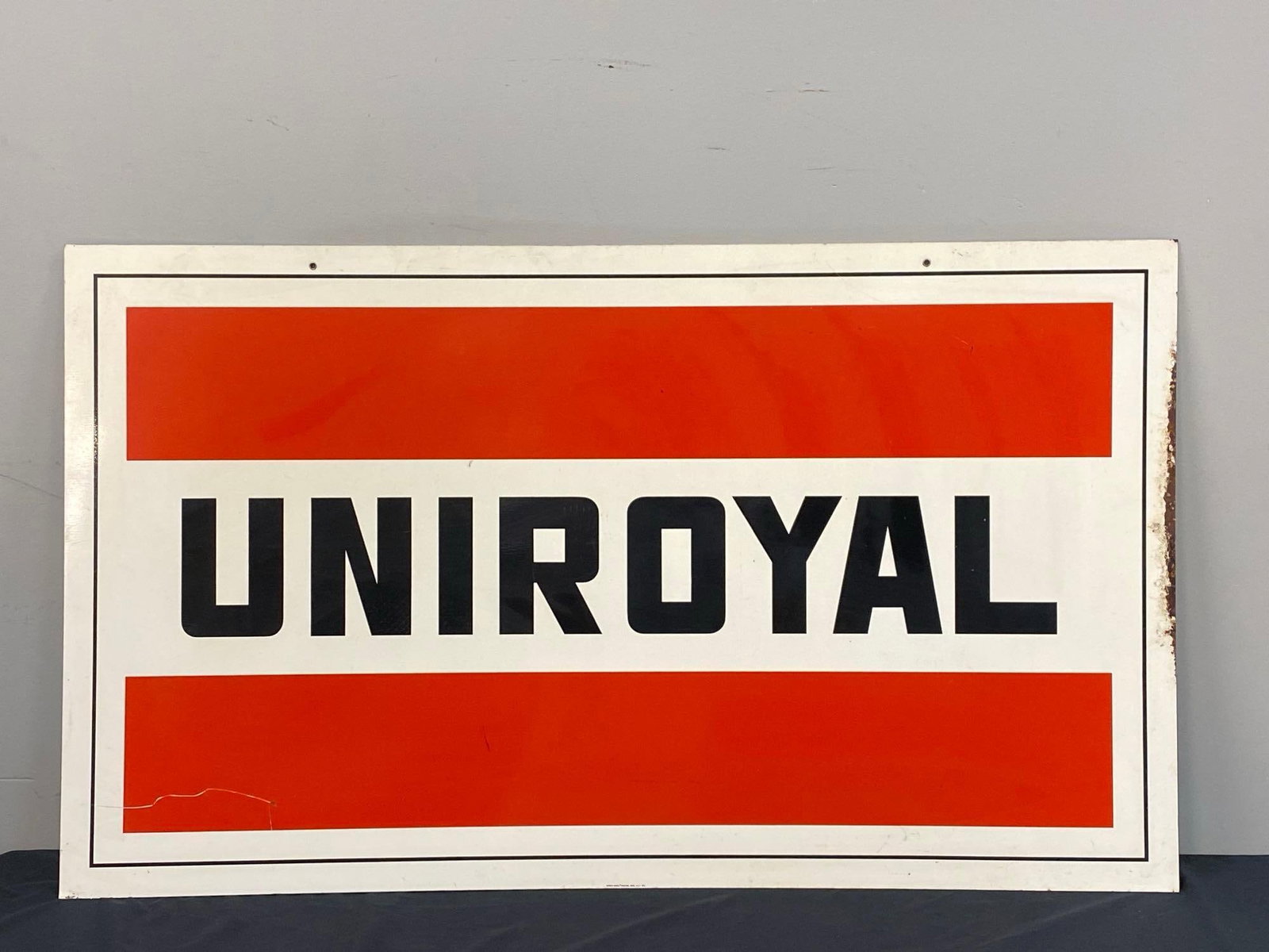 Double Sided Uniroyal Painted Metal Advertising Sign: NO SHIPPING AVAILABLE, THIRD PARTY SHIPPING RECOMMENDED, measures 54 x 31 1/2 inches