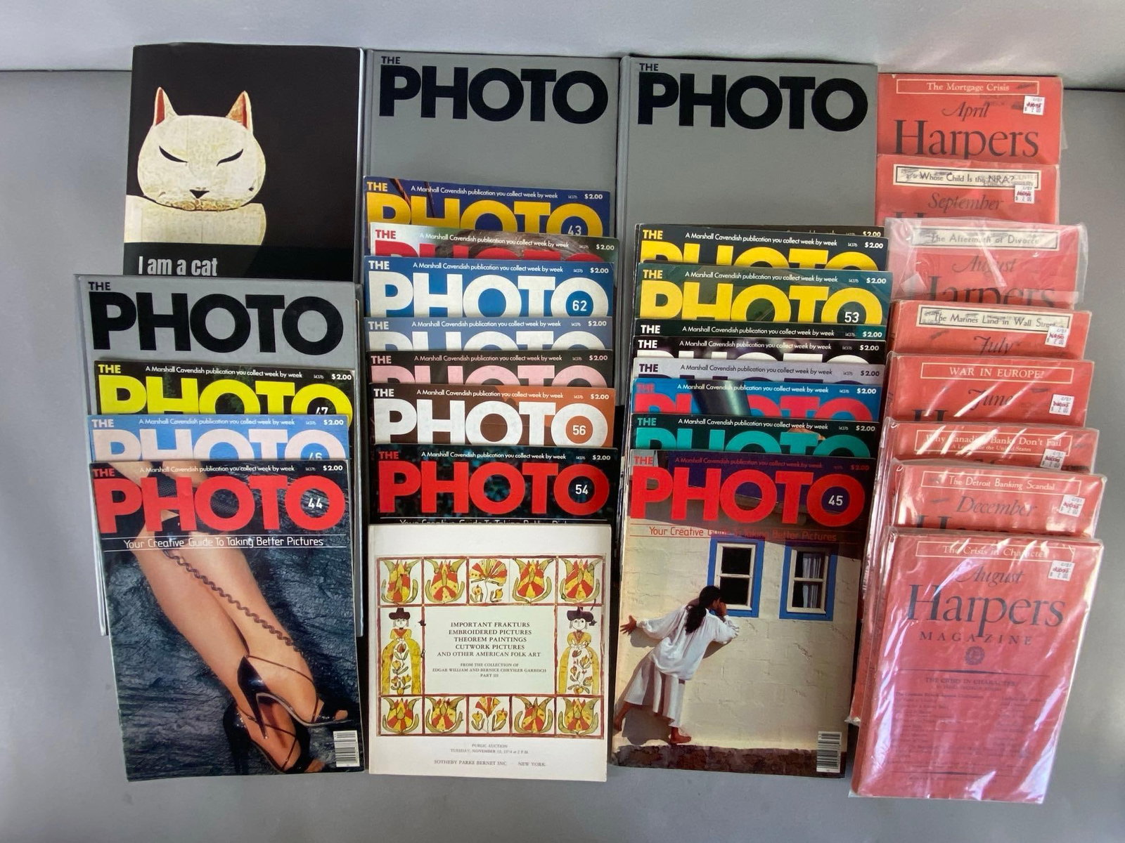 Group of The Photo Magazine and More: Includes binders and singles of The Photo Magazine, Harper?s Magazine, Japanese books, and more, Largest measures 12 x 9 1/4 inches.