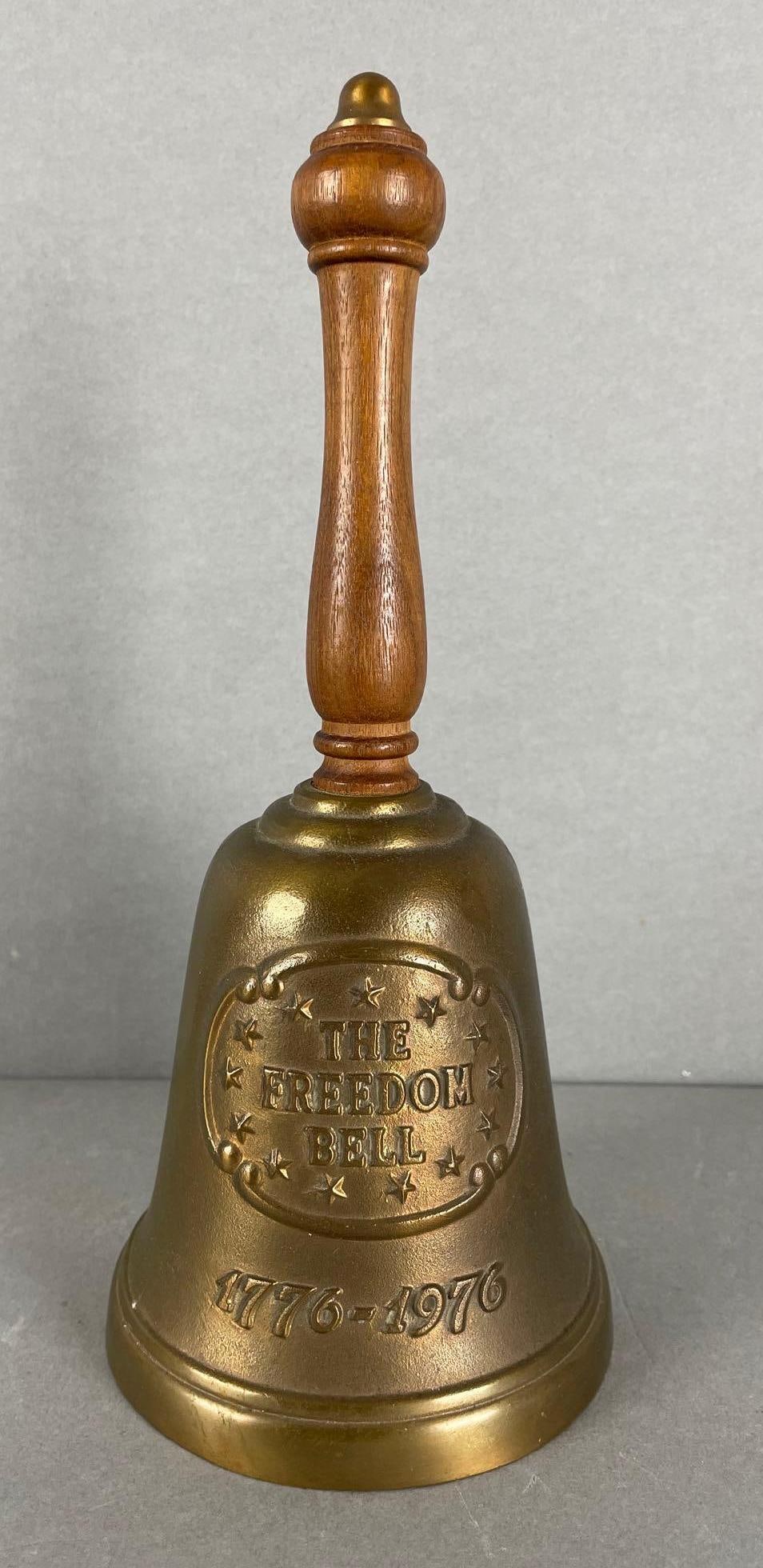 Limited Edition Bicentennial Cast Bronze Freedom Bell: Limited no. 8781/9800. 1776-1976, wood handle. Measures 10 x 4 1/2 inches