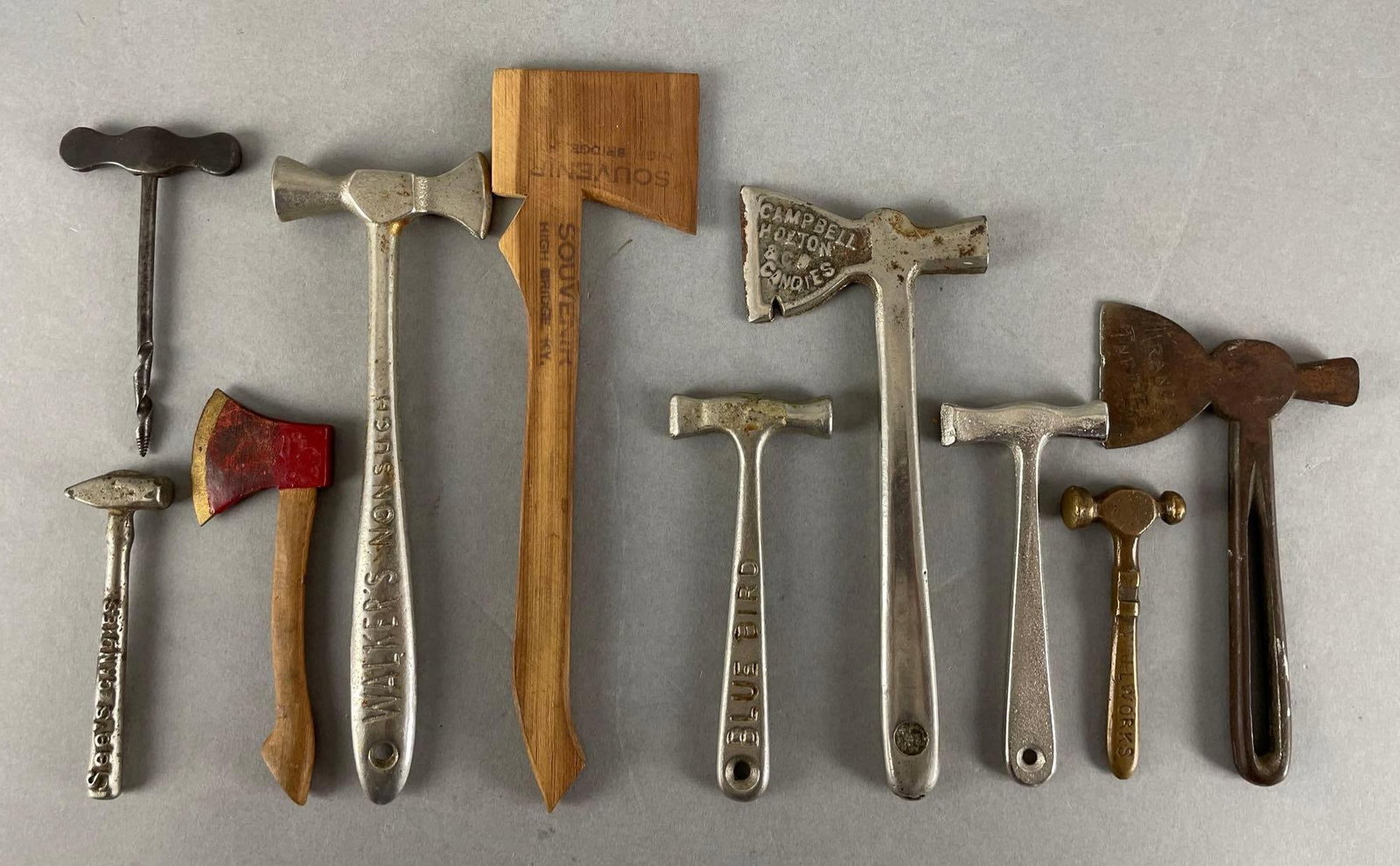 Group of Toffee Hammers and More: Includes wood souvenir axes, see's candies, blue bird. Largest measures 8 x 2 1/4 inches
