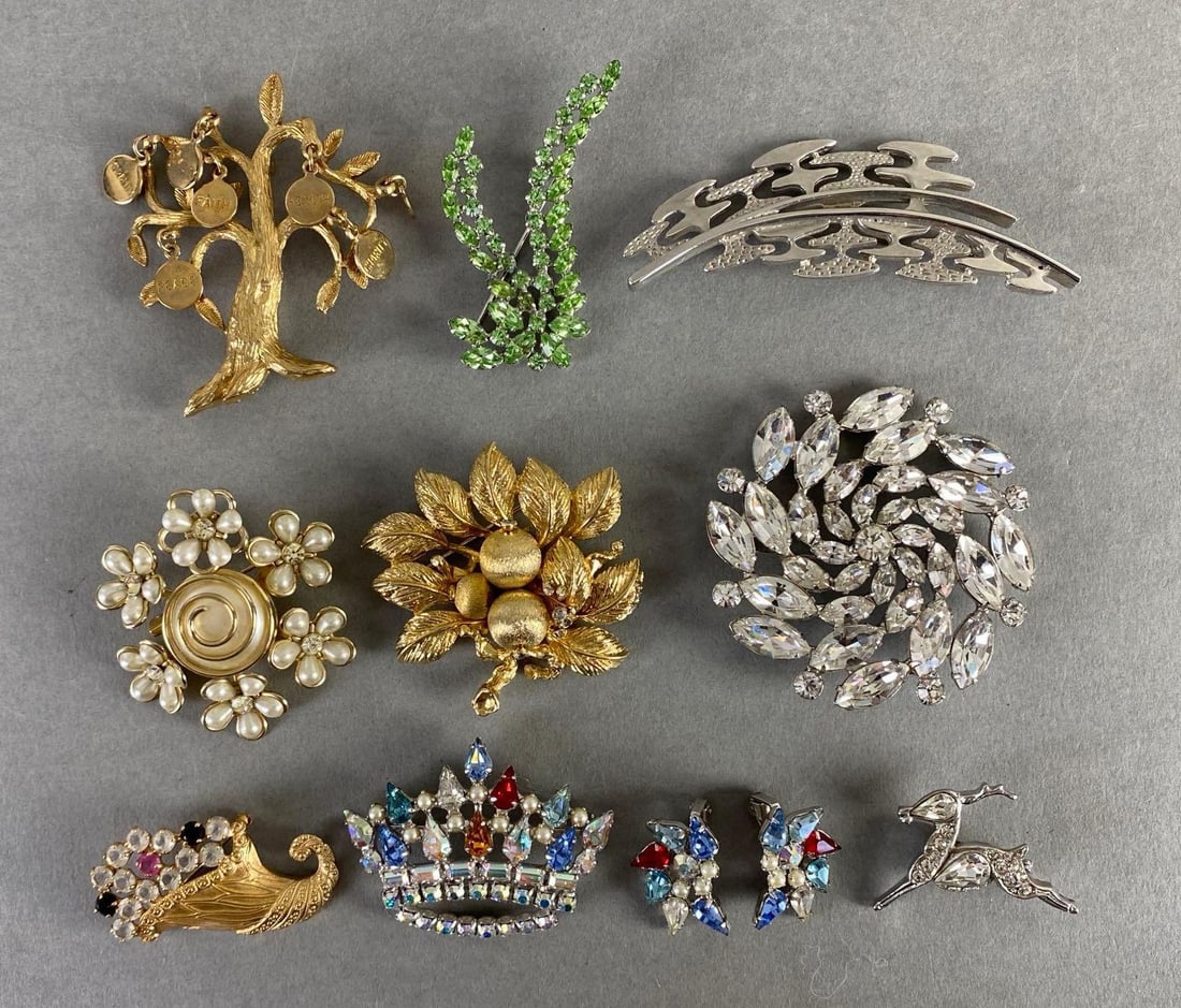 Group of Rhinestone Costume Jewelry and More: Includes Coro, B.David, and more, Includes tree x leaves, cornucopia, and more, Largest measures 3 1/4 x 1 inches.