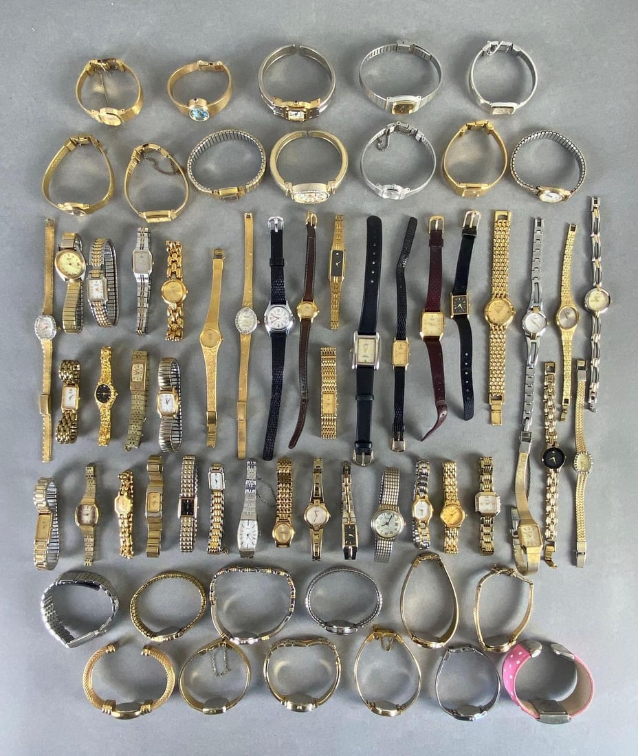 Group of Womens Wristwatches in Glass Jar: Unknown working conditions, Includes Seiko, Pulsar, Citizen, and more, Jar measures 11 3/4 x 4 3/4 x 4 3/4 inches.