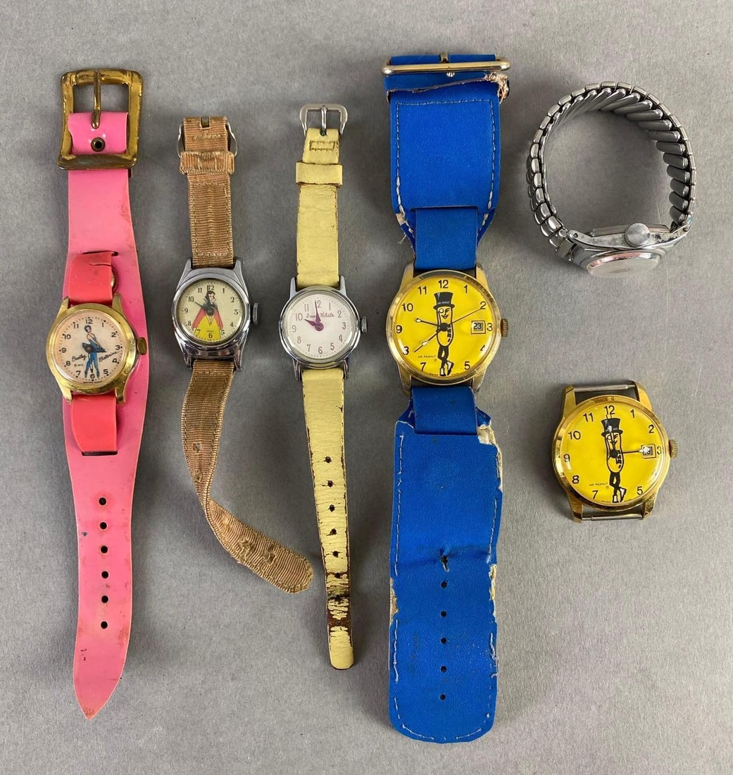 Group of Character Wristwatches: Unknown working condition, Includes Snow White, Cinderella, Mr. Peanut, and more, Largest watchband measures 8 inches long.