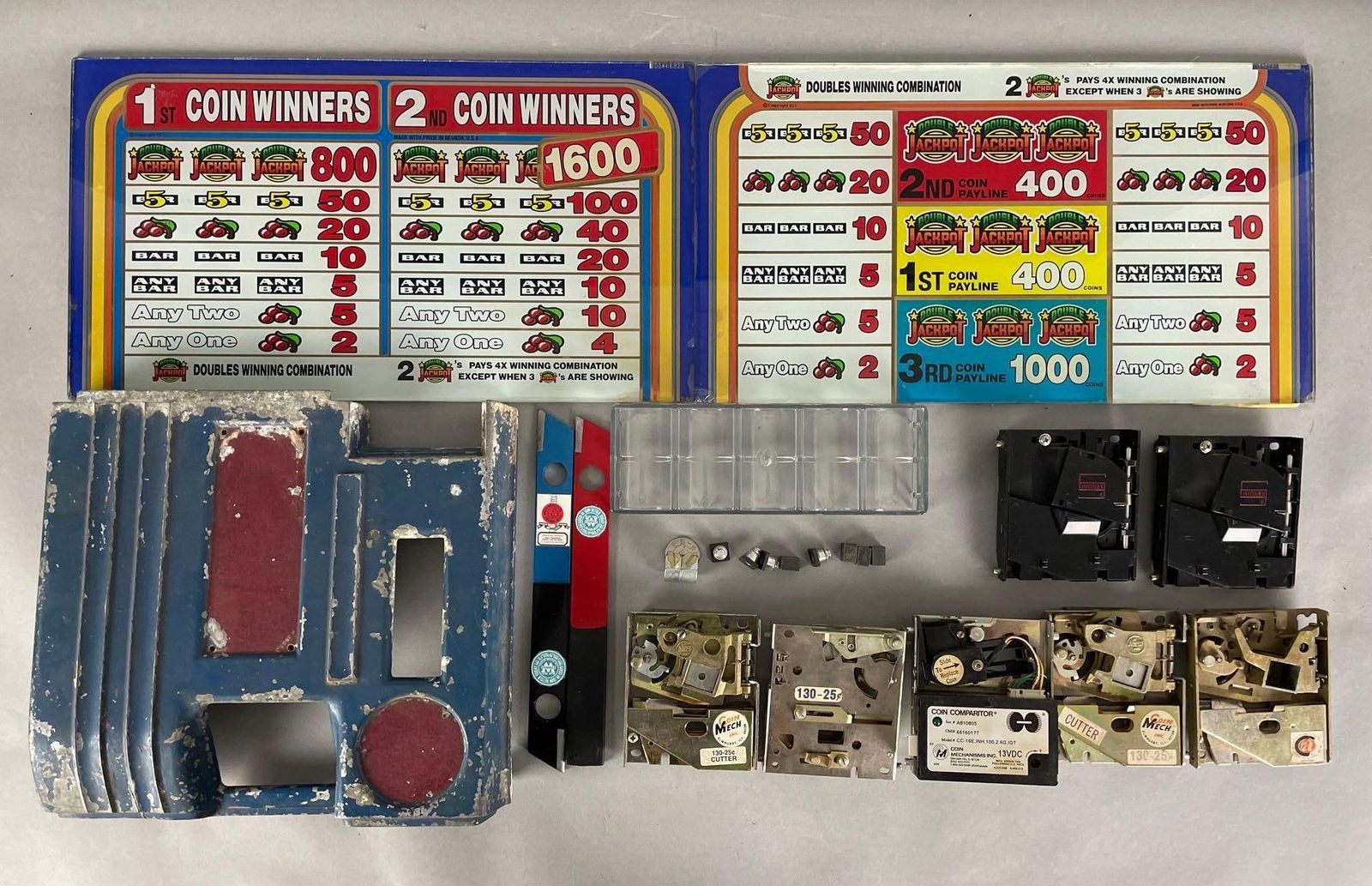 Coin Slot Machine Parts: Includes glass screens, cutters, coin comparitor, and more. Glass measures 9 x 16 1/2 inches