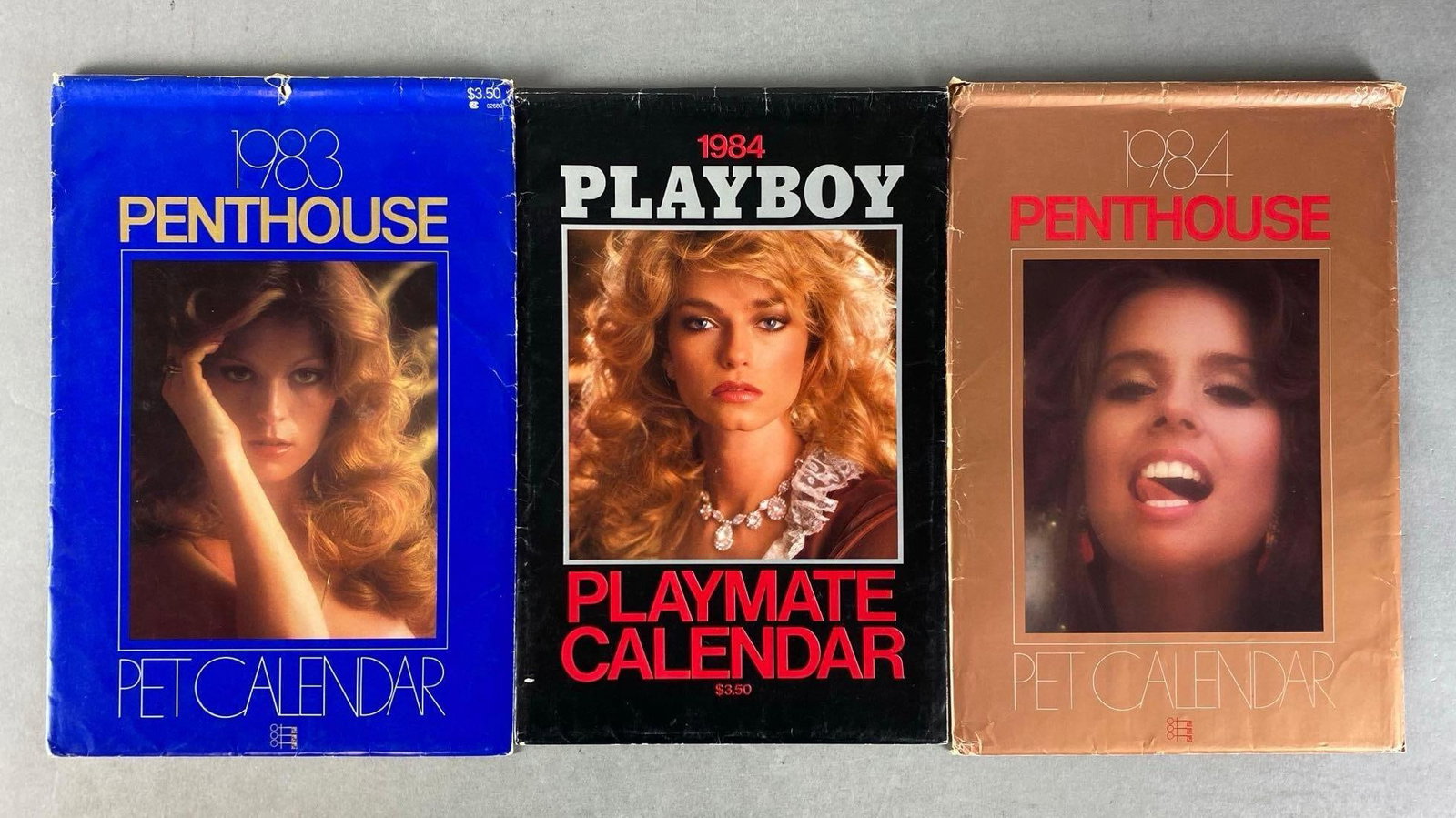 Group of 3 Playboy and Penthouse Calendars: Includes 1983 and 1984, all complete, largest measures 9 x 14 inches