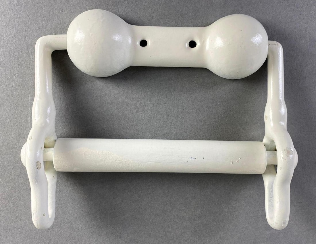 Antique Cast Metal Toilet Paper Holder: Painted white, Measures 5 x 7 x 1 3/4 inches.