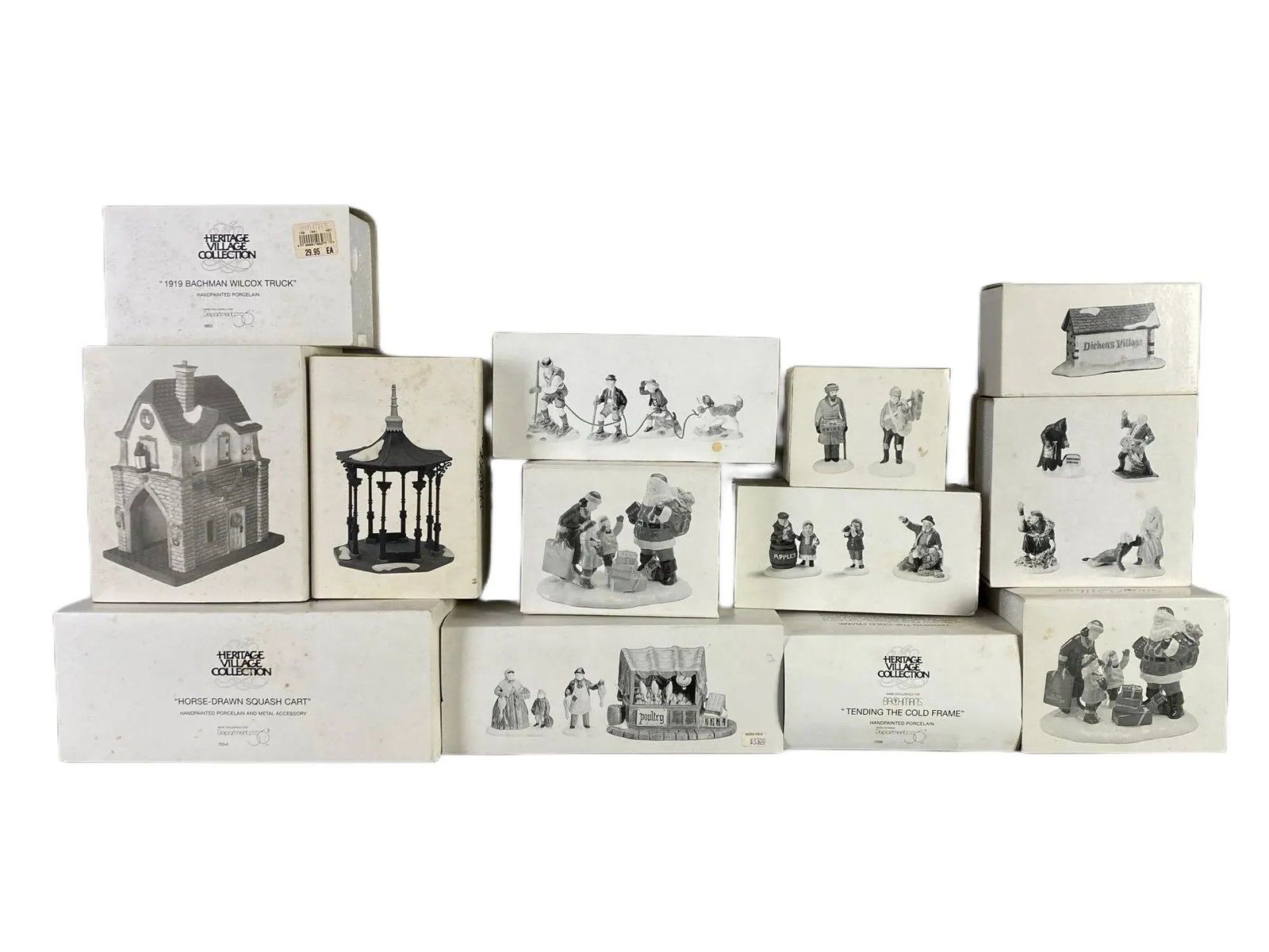 Group of Department 56 Christmas Village Figures and More: Includes Climb Every Mountain, Village Street Peddlers, The Old Man and the Sea, and more, In original boxes, Largest box measures 4 1/2 x 11 x 6 1/2 inches.
